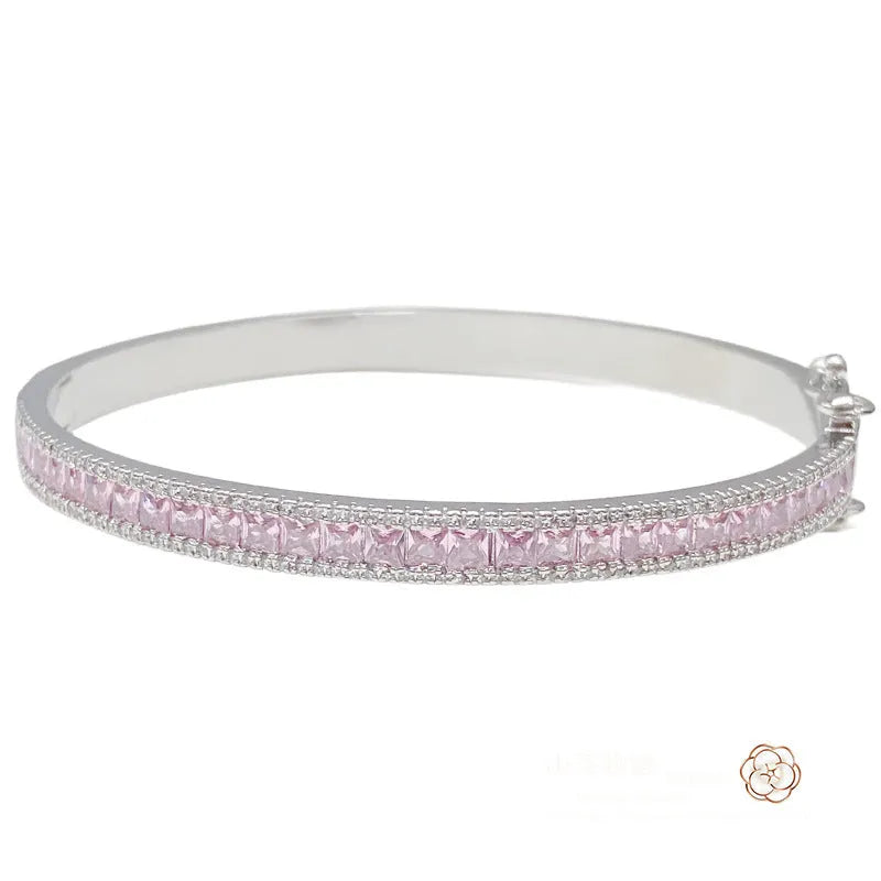 Rainbow colourful copper geometric wristband with gold inlay, 54mm inner diameter, on white background