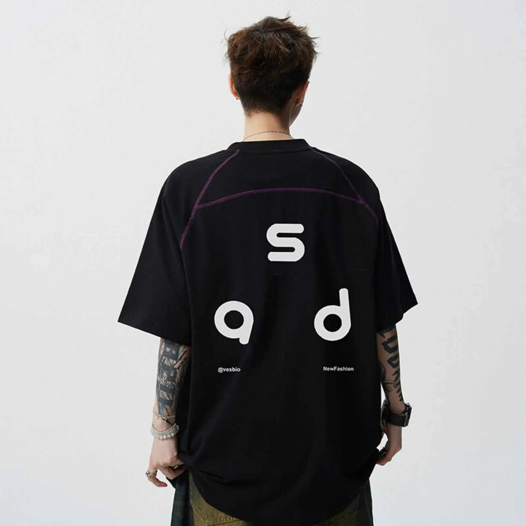 Loose fit black cotton t-shirt with a white letter print design on the front.