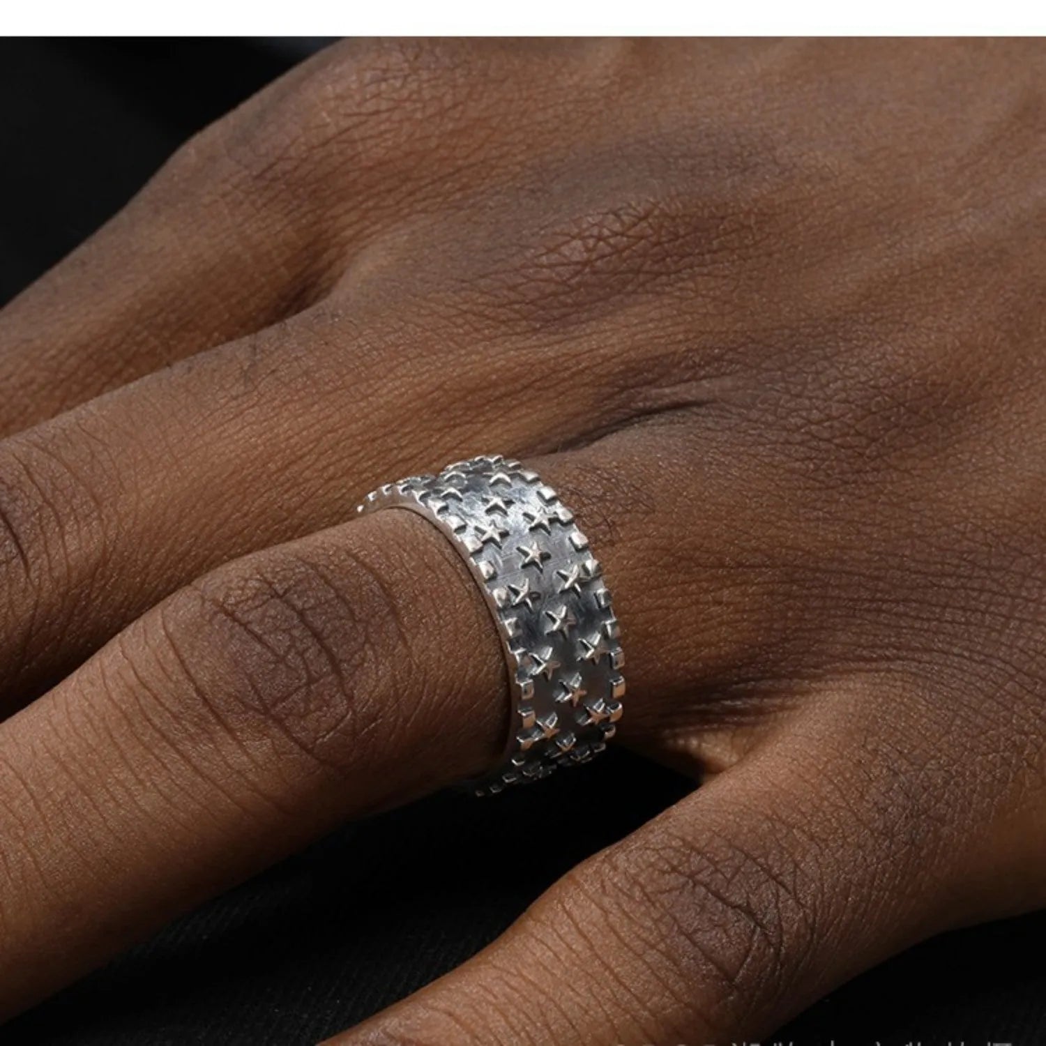 Pure silver multi five-pointed star ring with adjustable opening on a finger