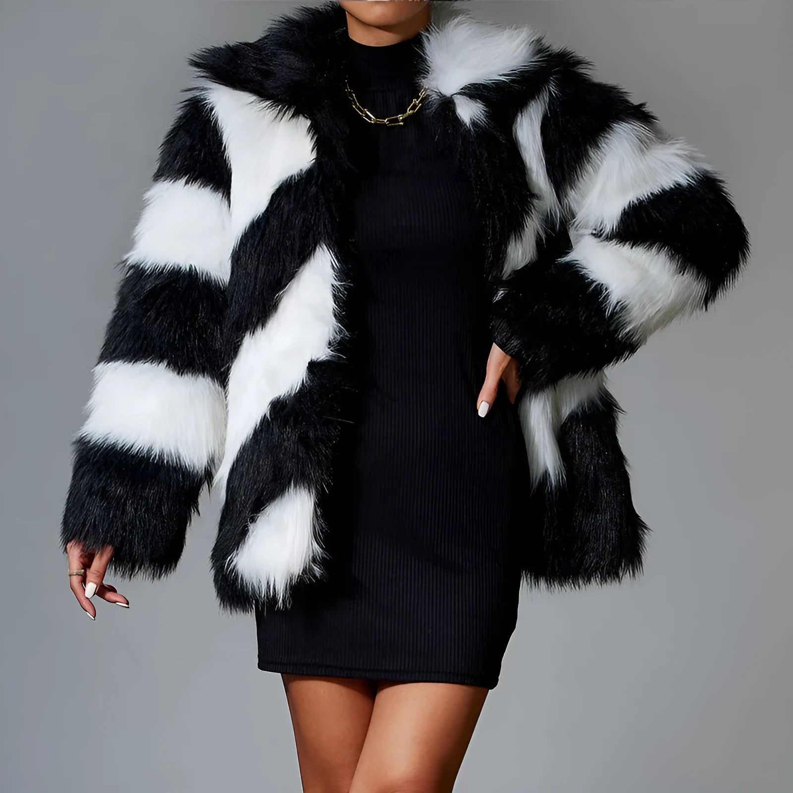 Women's faux fur coat with contrast lapel and fur collar in mid-length design