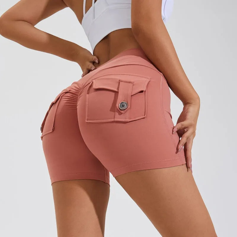 Women's high waist fitness shorts with pockets in avocado green colour for yoga and workouts
