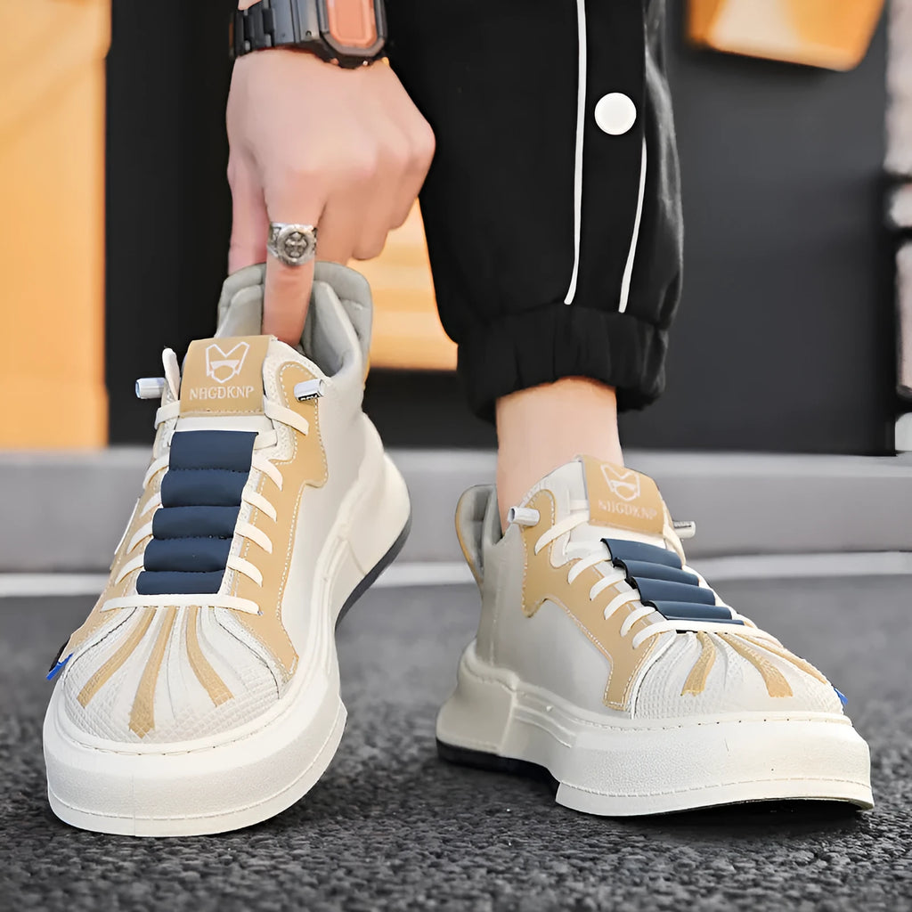 Men's beige low-top casual sneakers with elastic band fastening and leather stitching detail on microfiber upper.