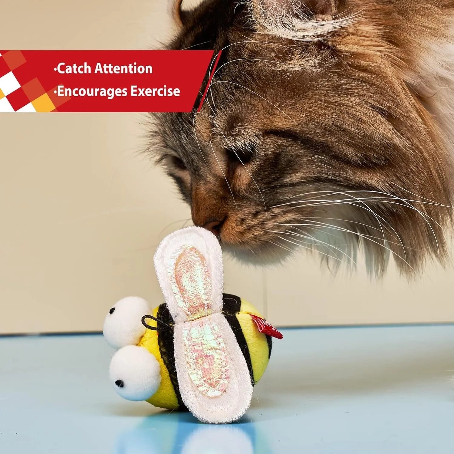 Yellow flannelette bee-shaped electronic cat toy on a plain background.