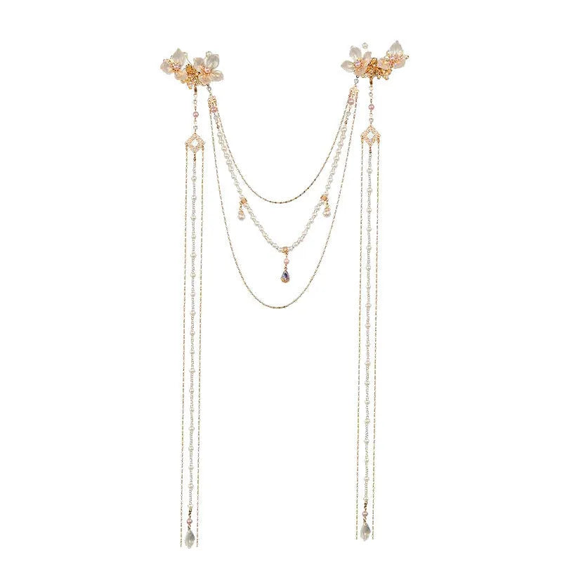 Gold grip hairpin for women with pearl, diamond, flower decorations and a long tassel.