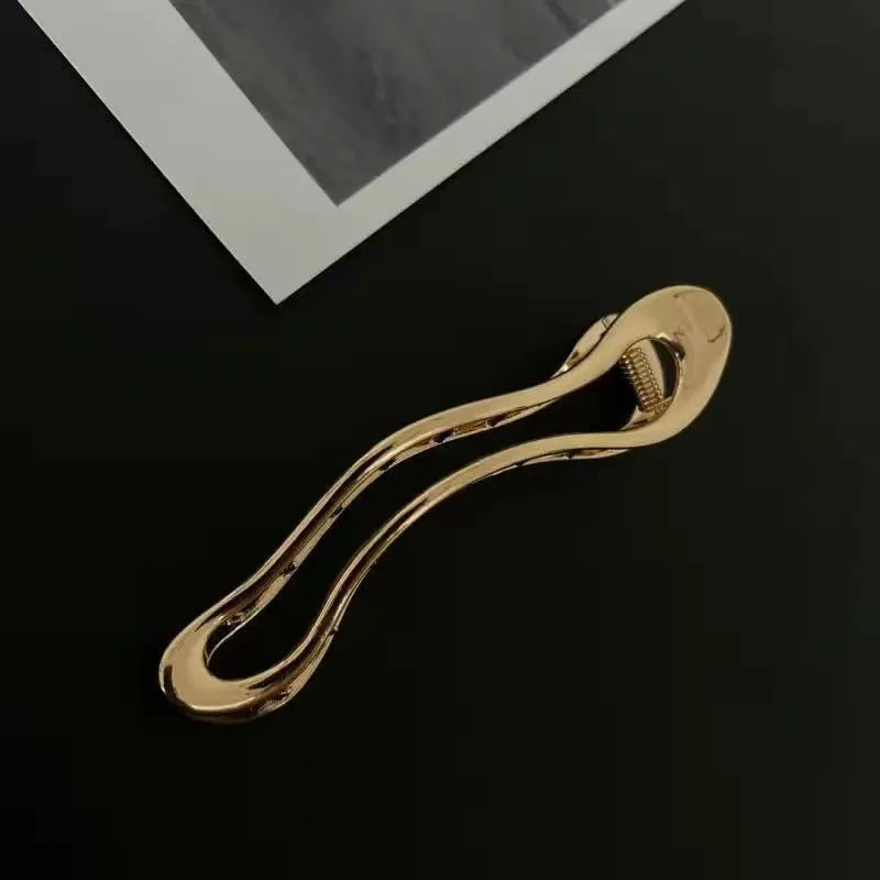 Zinc alloy hair barrettes in geometric shapes with gold and silver polished finishes