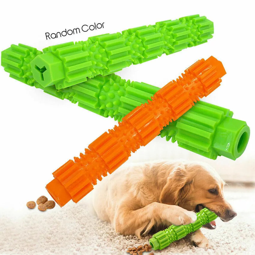 Green durable rubber dog chew toy with treat-dispensing hole and squeaker, for aggressive chewers.