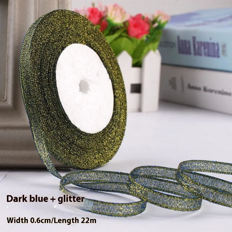 Roll of narrow 0.6cm wide polyester gift wrapping ribbon in assorted colours, showing 22 metre length.