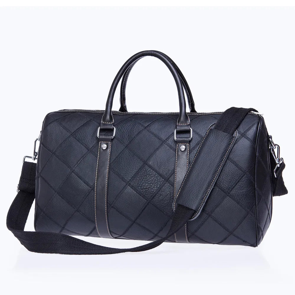 Vintage brown cowhide leather men's duffel bag with a single strap, shown open to reveal internal phone and ID pockets.