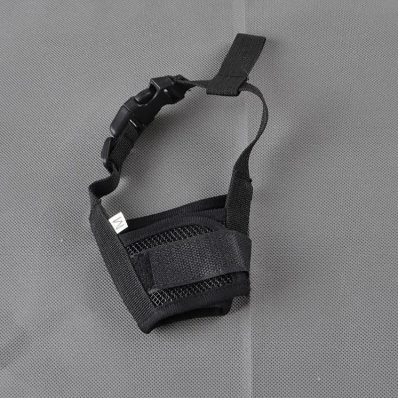 Adjustable plastic dog muzzle in assorted colours on a size chart showing measurements from 12cm to 34cm.