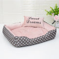 Polka dot print small dog bed with matching square embroidery pillow in grey, blue, pink, or red.