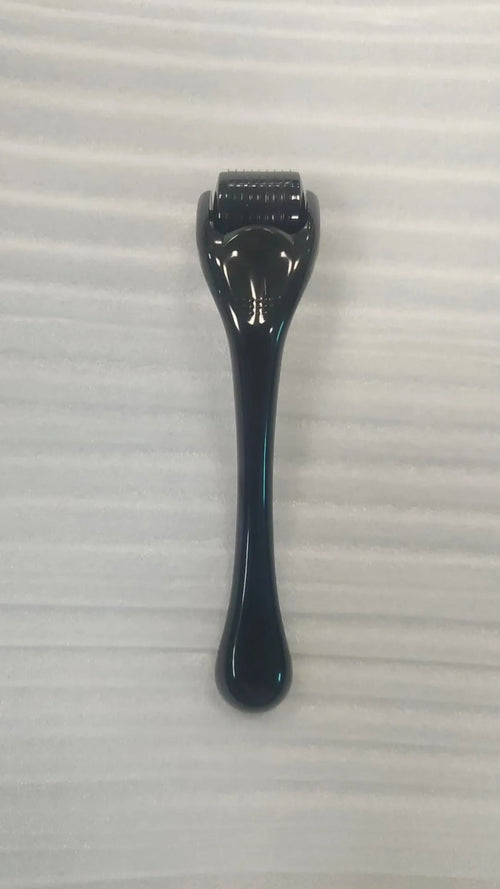 540 micro needle derma roller showing handle and wheel in different colour combinations with size specifications