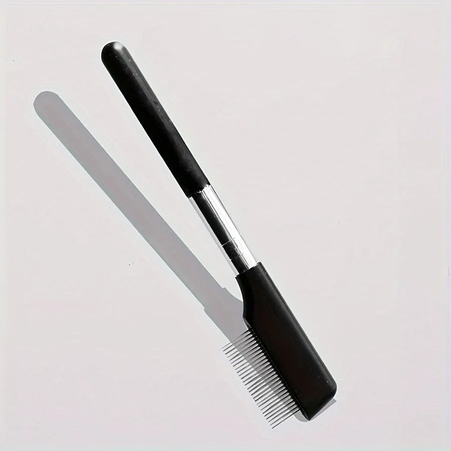Black pet grooming brush with soft silicone bristles and comb attachment for tear stain removal on dogs and cats