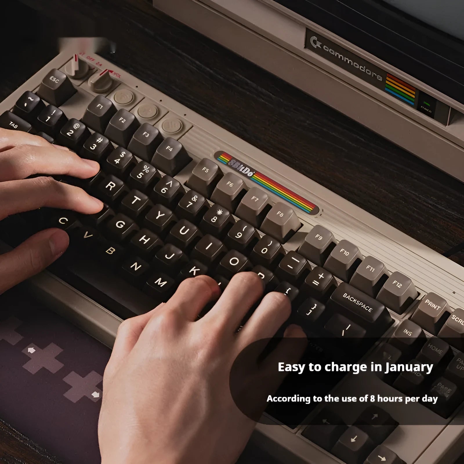 Retro87 C64 wireless Bluetooth mechanical keyboard with rocker on a desk.