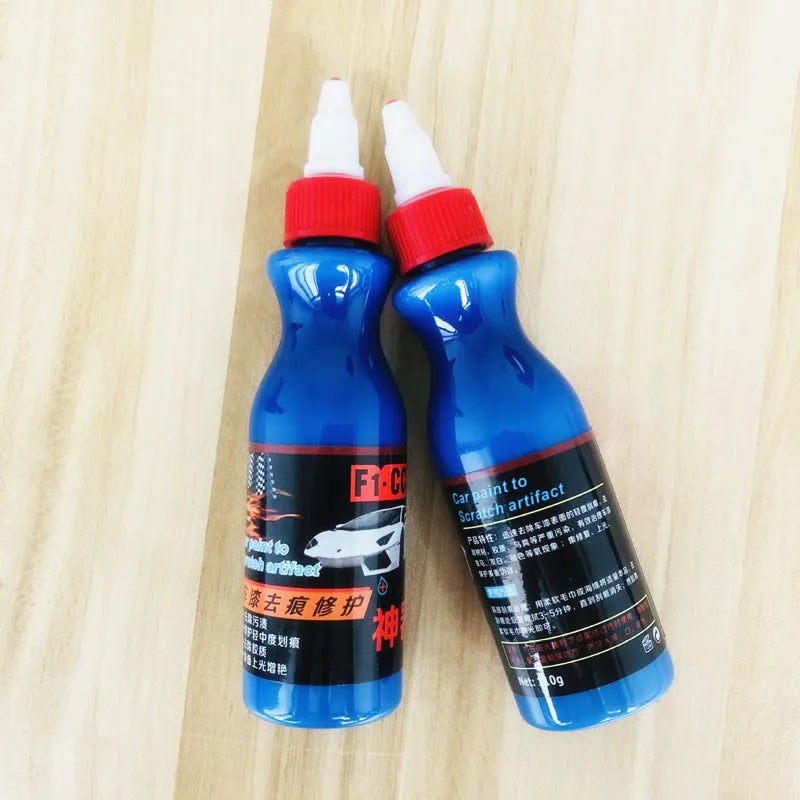 Small blue car scratch repair wiping tool kit with applicator pad and repair agent bottle