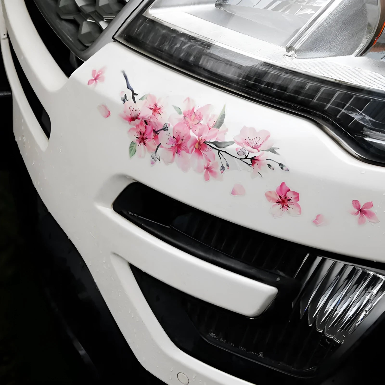 Cherry blossom flower car sticker in small and large size options on a vehicle door.