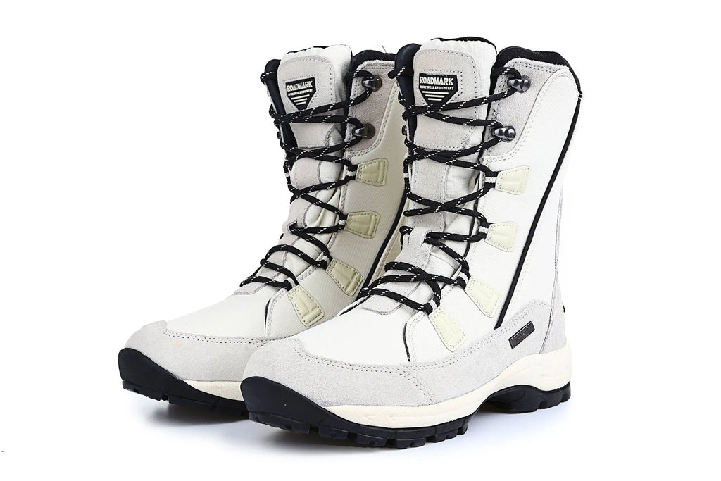Women's black genuine leather mid-calf snow boots with round toe and rubber sole on a white background.