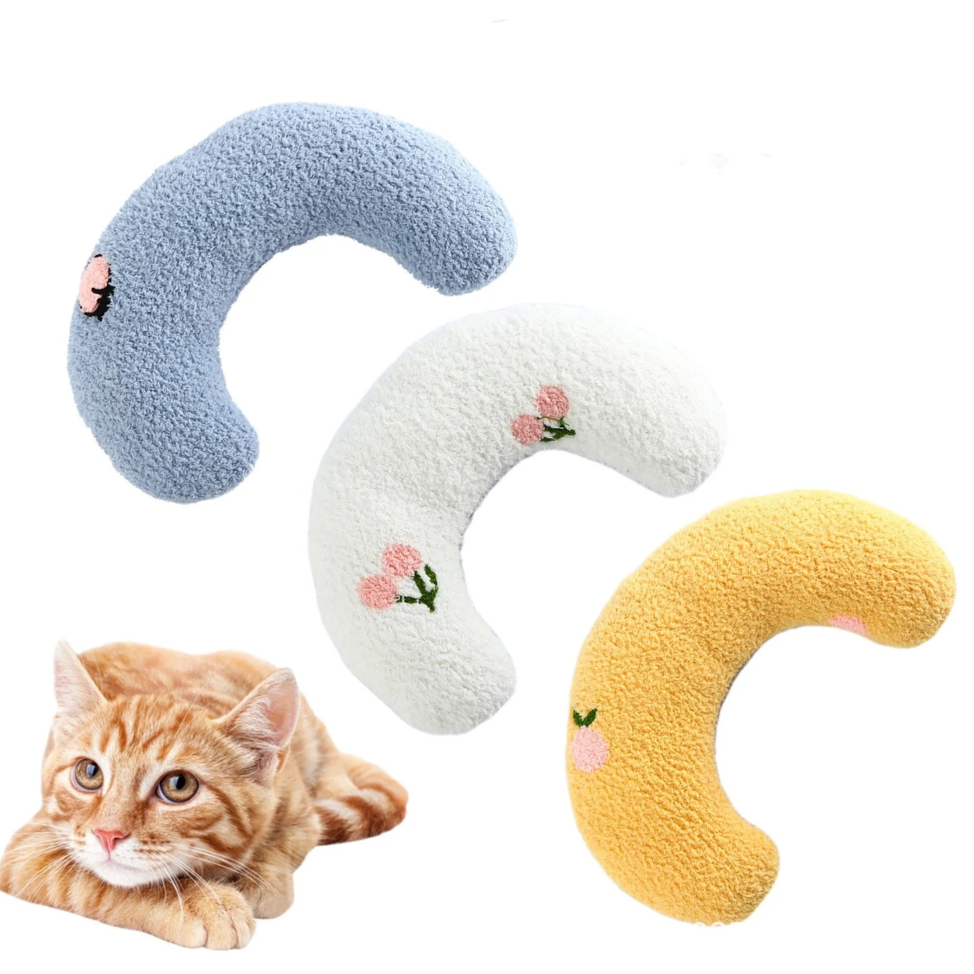 Small white U-shaped plush pet pillow for cats and small dogs on a neutral background.