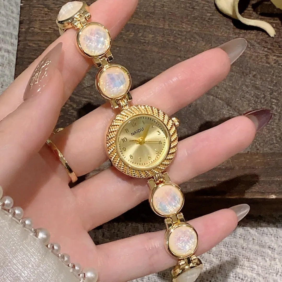 Women's quartz watch with 25mm round dial in one of six colours including milky white and dark green