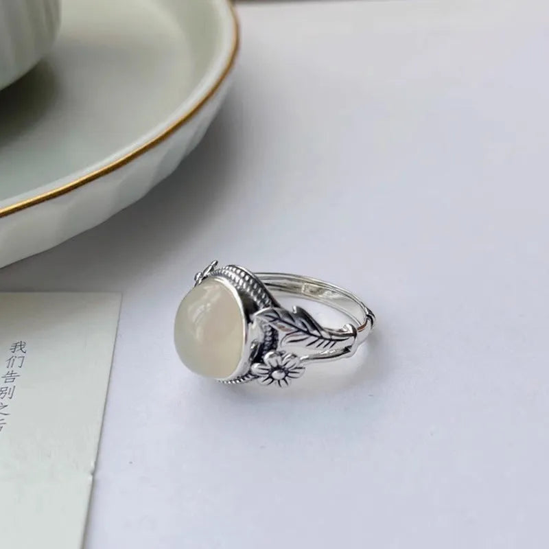 Adjustable copper vintage ring with white chalcedony stone and U-shaped band