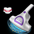 Pink handheld mite vacuum cleaner with nozzle on a mattress.