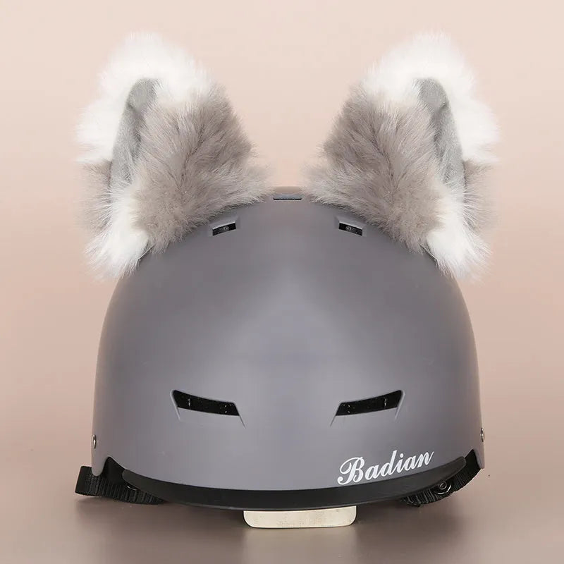 A plush fabric helmet cover with cartoon character ears, shown in size M for bicycle or motorbike use.