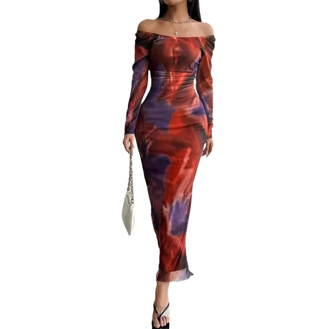 Womens long printed mesh fishtail dress with gradient colour pleating and split skirt detail