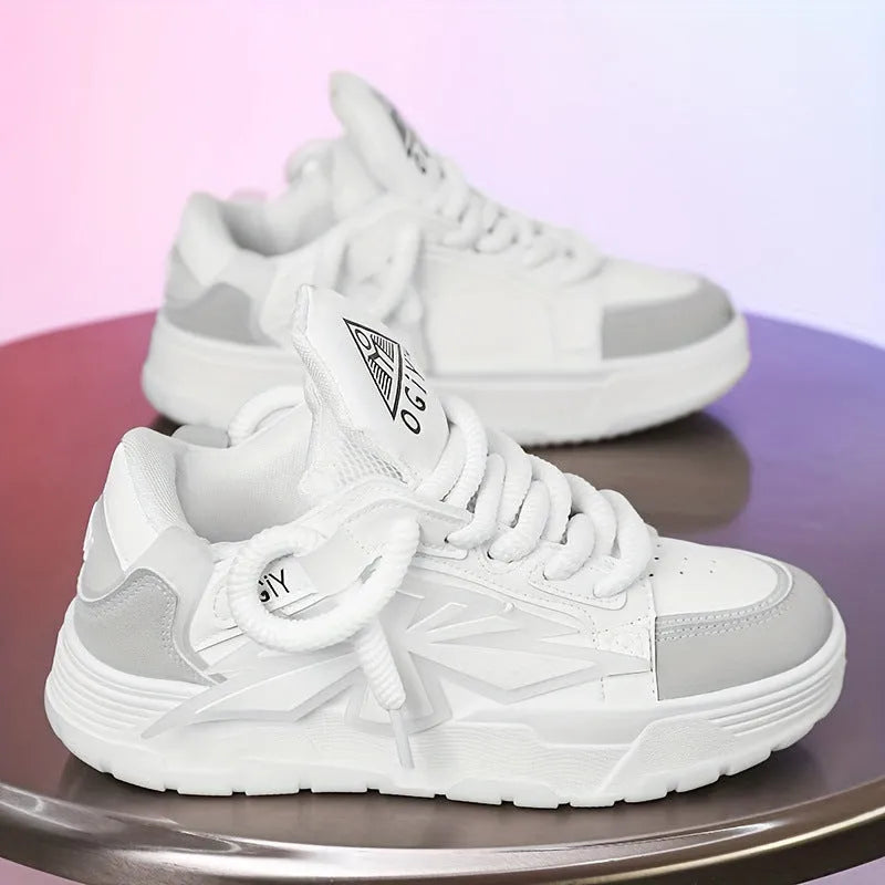 Men's white chunky sneakers with thick rubber sole and totem pattern detail on synthetic leather upper