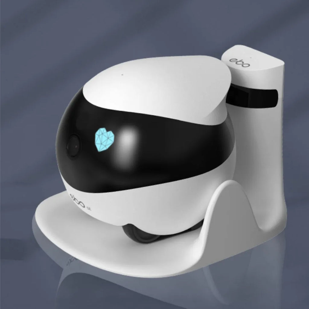 White smart home mobile surveillance robot camera on floor with docking station