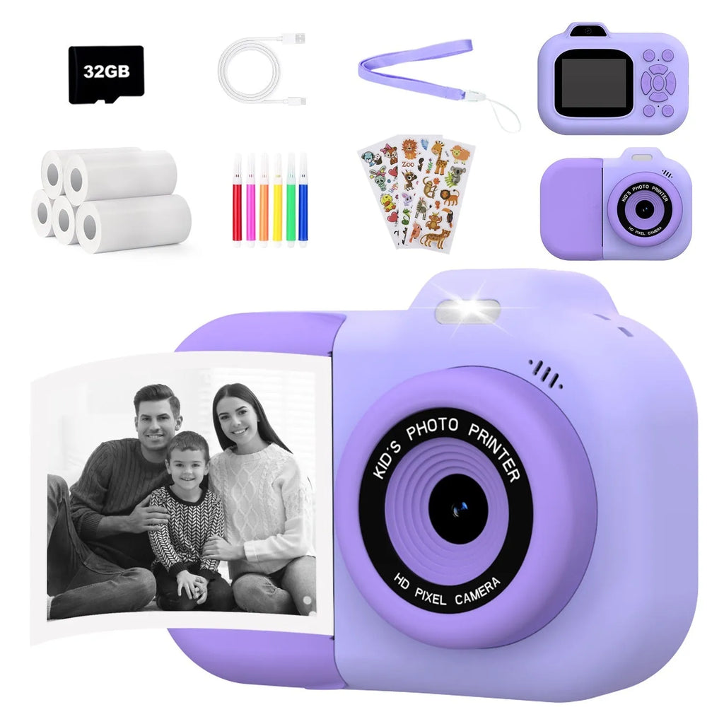 Blue children's digital camera toy with video recording, games, and photo sticker functions on a table.