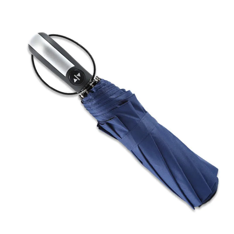 Automatic open triple folding business umbrella in black colour showing steel rib construction