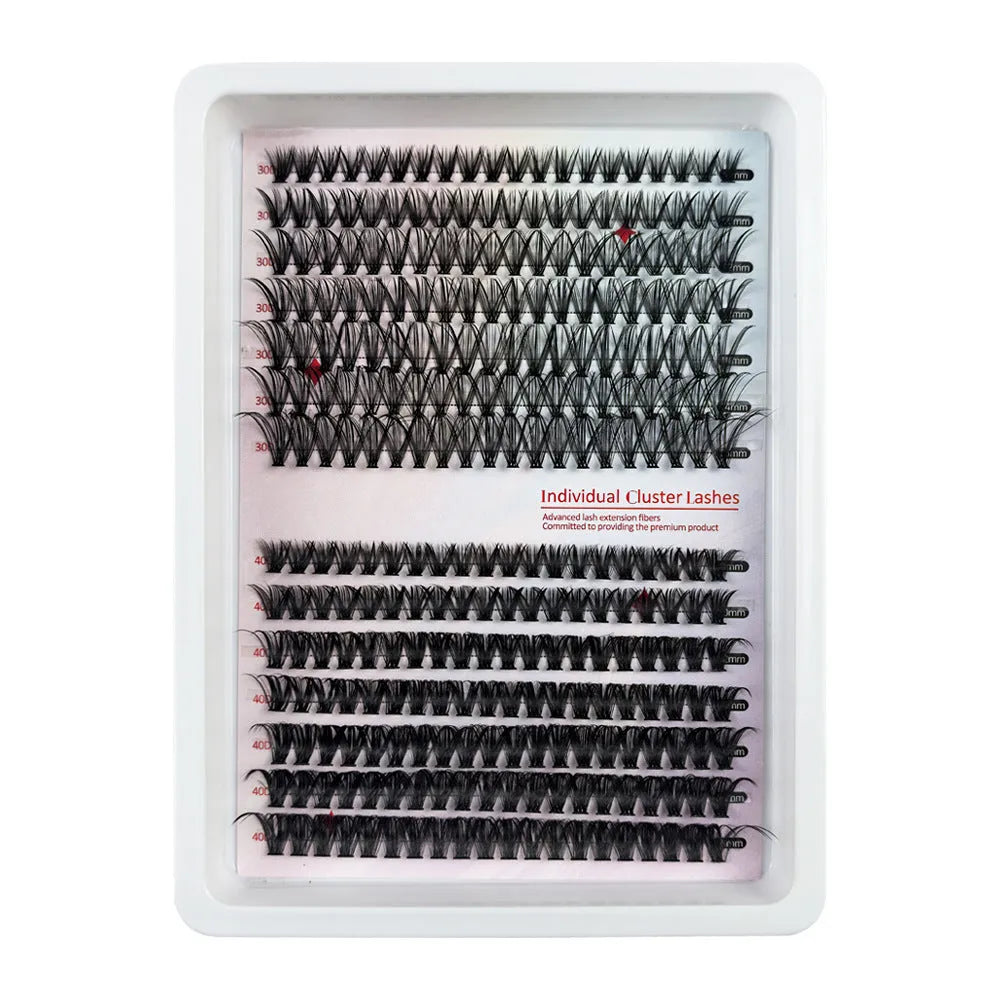 Box of assorted messy style false eyelashes showing multiple lash sets on a clear tray