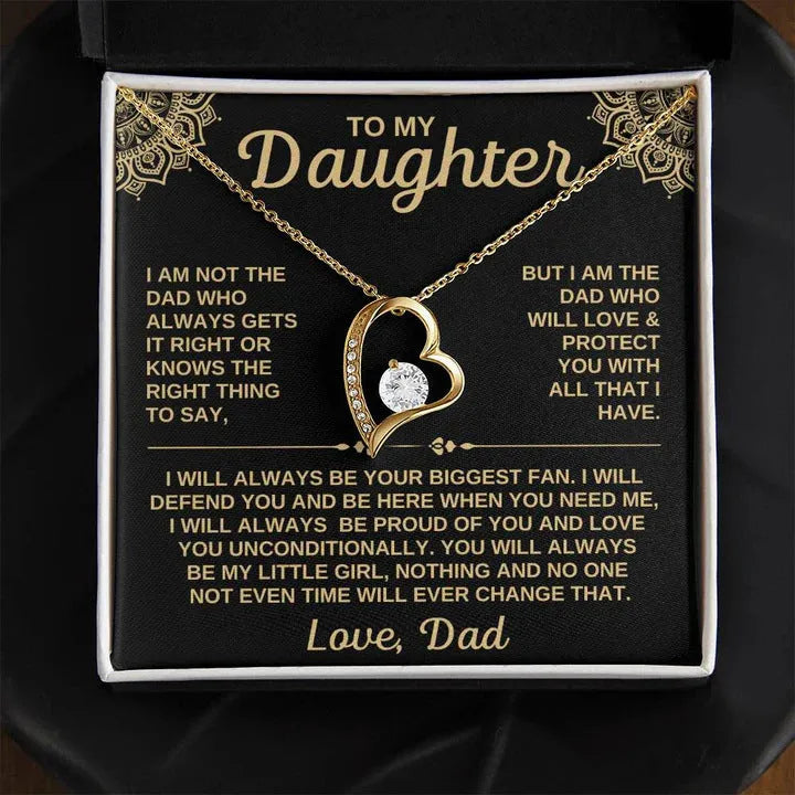 Gold hollow heart pendant necklace presented in an open flip gift box with a card.