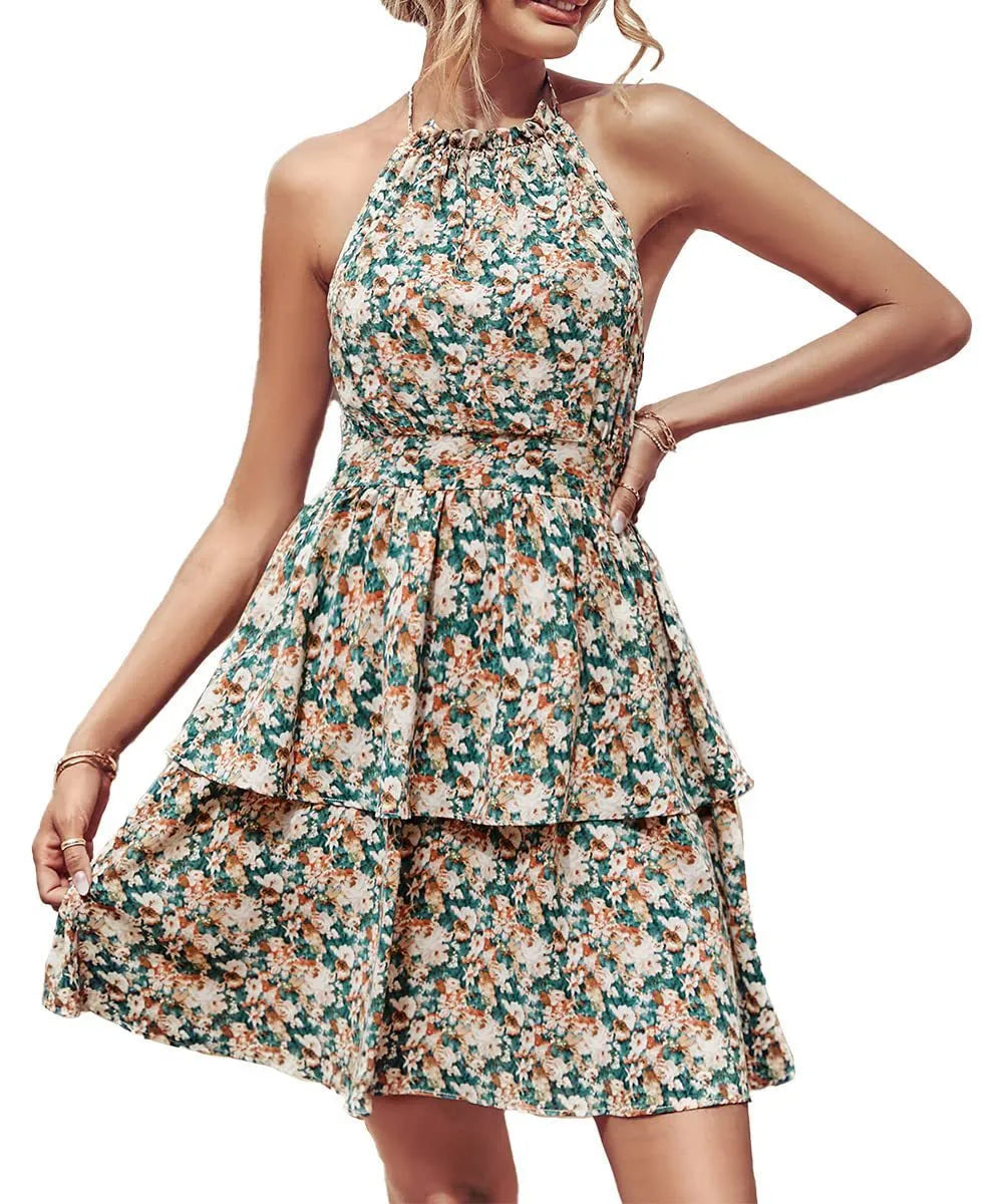 Women's summer halter dress with backless boho design and A-line ruffle detailing in printed polyester