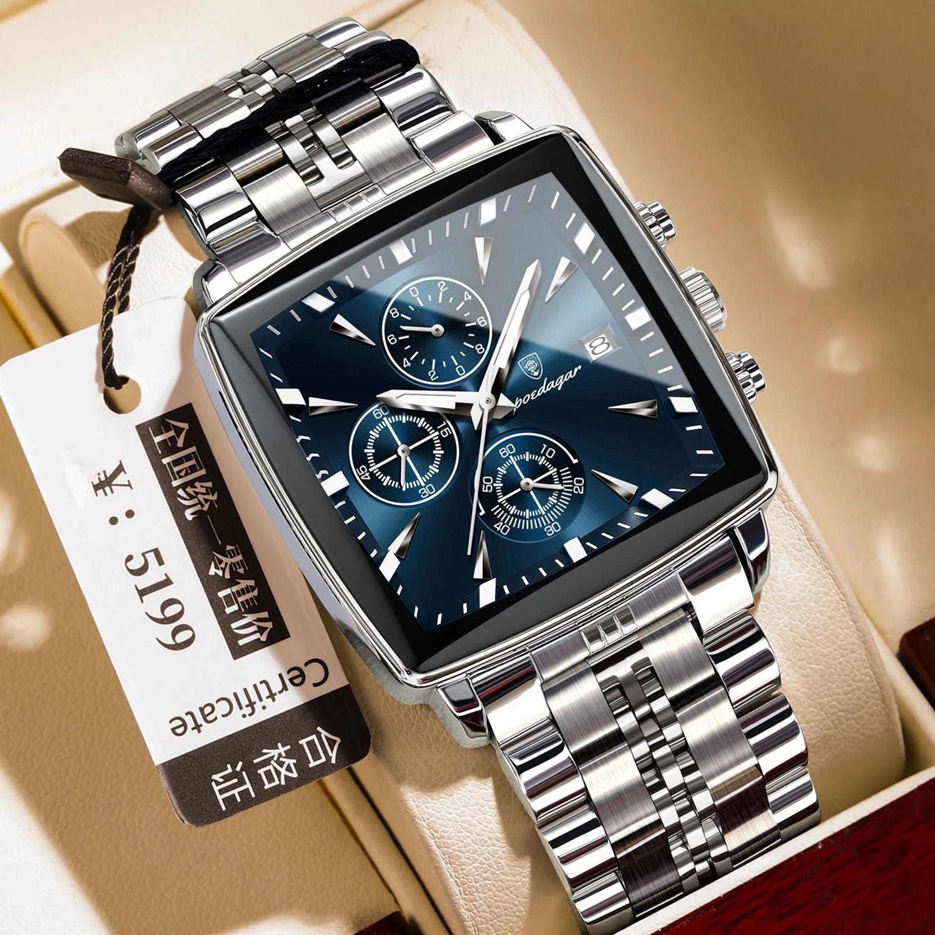 Square men's business watch with alloy case and stainless steel bracelet on wrist.