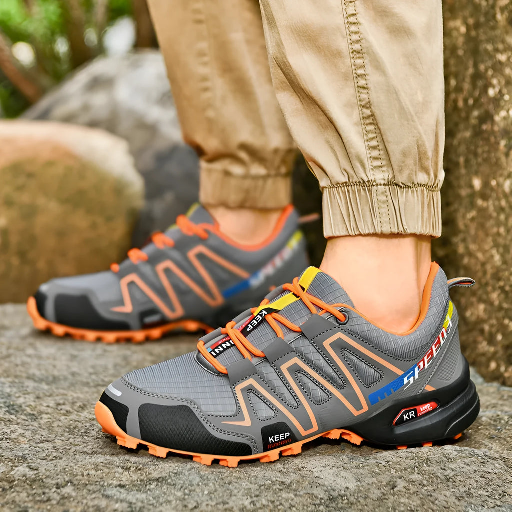 Men's grey and orange synthetic leather low-top casual shoes with a rubber sole