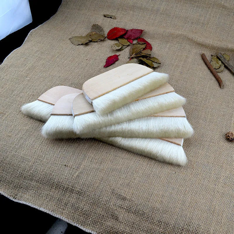 Wool brush for art mounting and shading projects in natural fibre construction
