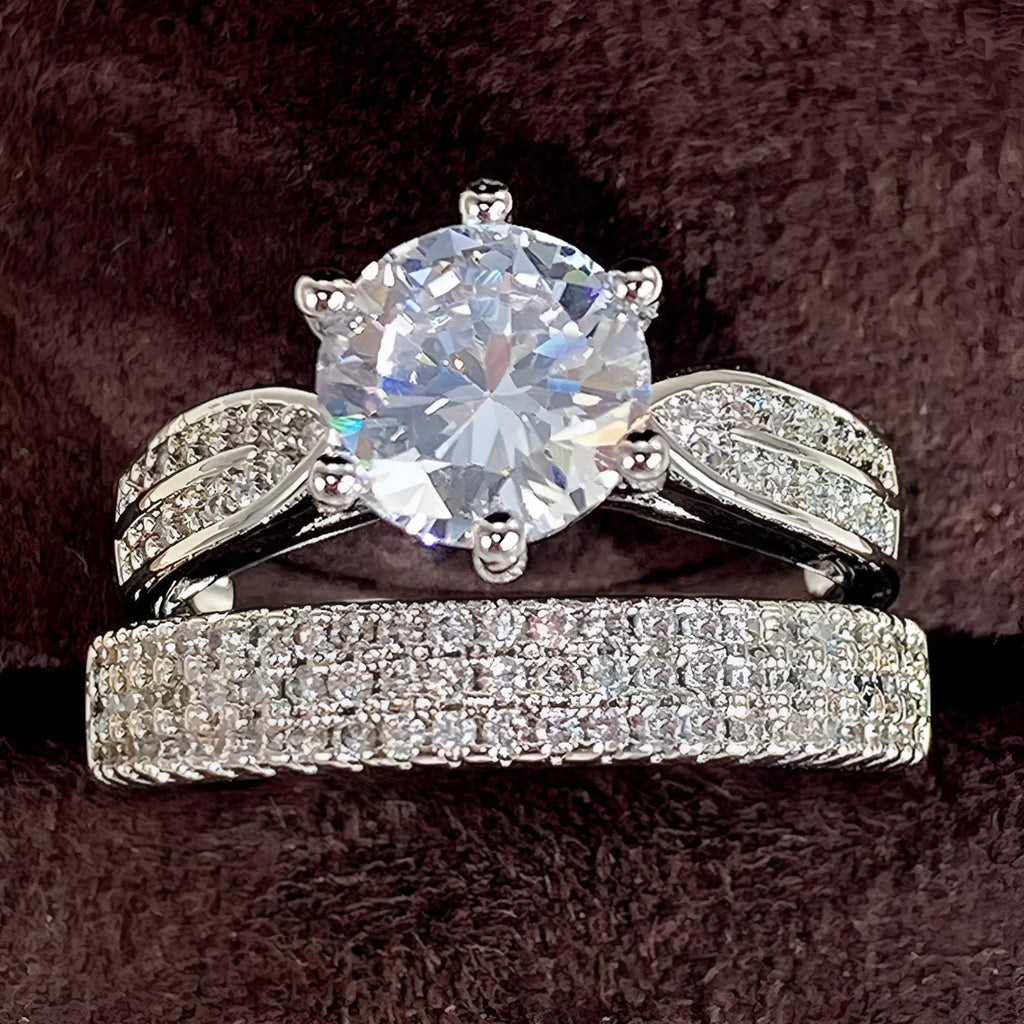 White gold colour combined ring and bracelet jewellery with geometric shape and round elements