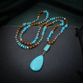 Blue turquoise drop pendant necklace on ball bead chain measuring 81cm