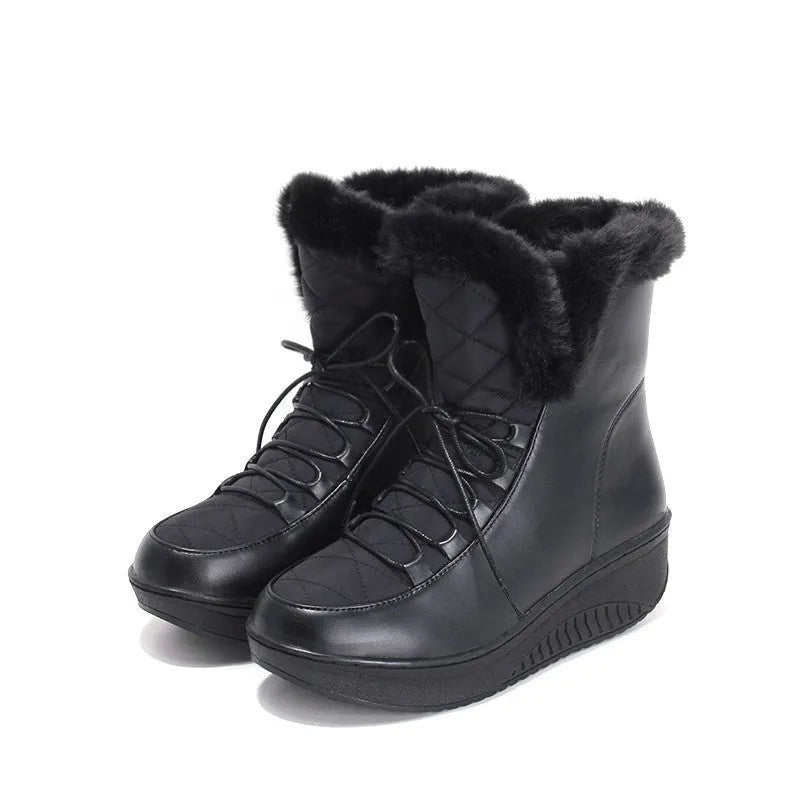 Women's black winter platform boots with lace-up closure and plush lining