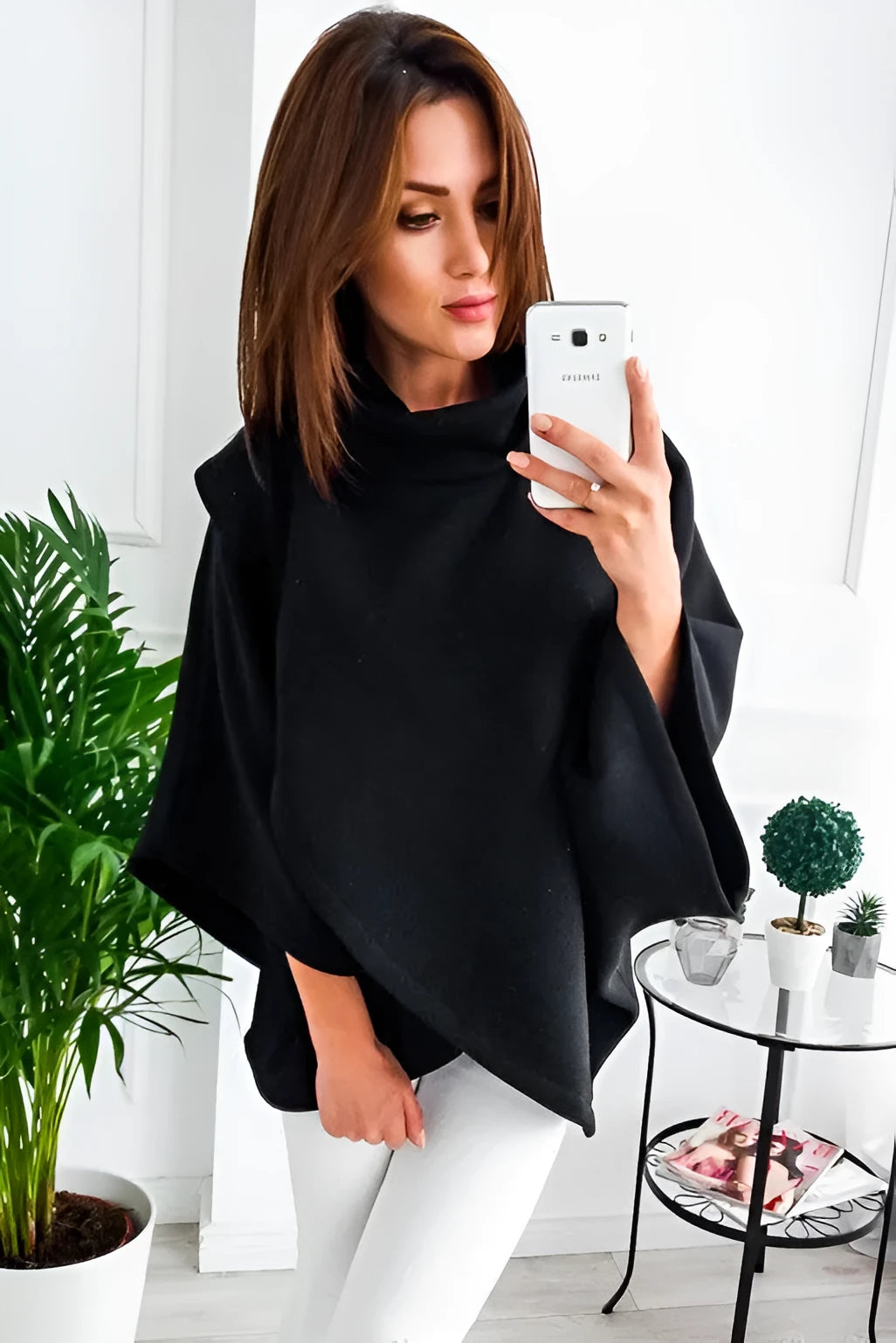 Women's longline batwing sleeve cardigan in a fleece-lined cotton blend, shown with three-button front and contrast stitching.
