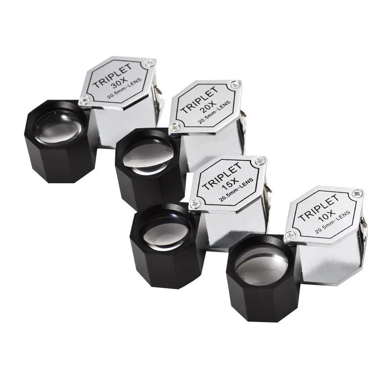 Handheld jeweller's loupe with metal frame and optical glass lenses for 10x to 30x magnification