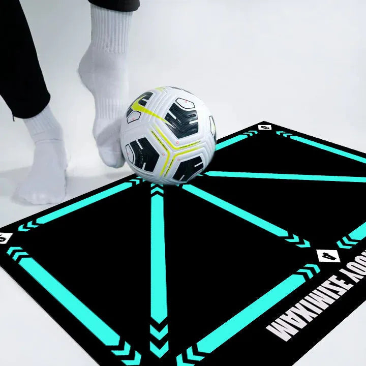 Black rectangular football training mat on a flat surface, dimensions 60cm by 90cm.
