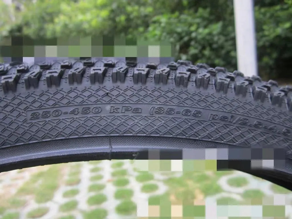 Ultralight mountain bike tyre with tread pattern shown, available in multiple sizes including 26, 27.5 and 29 inch diameters.