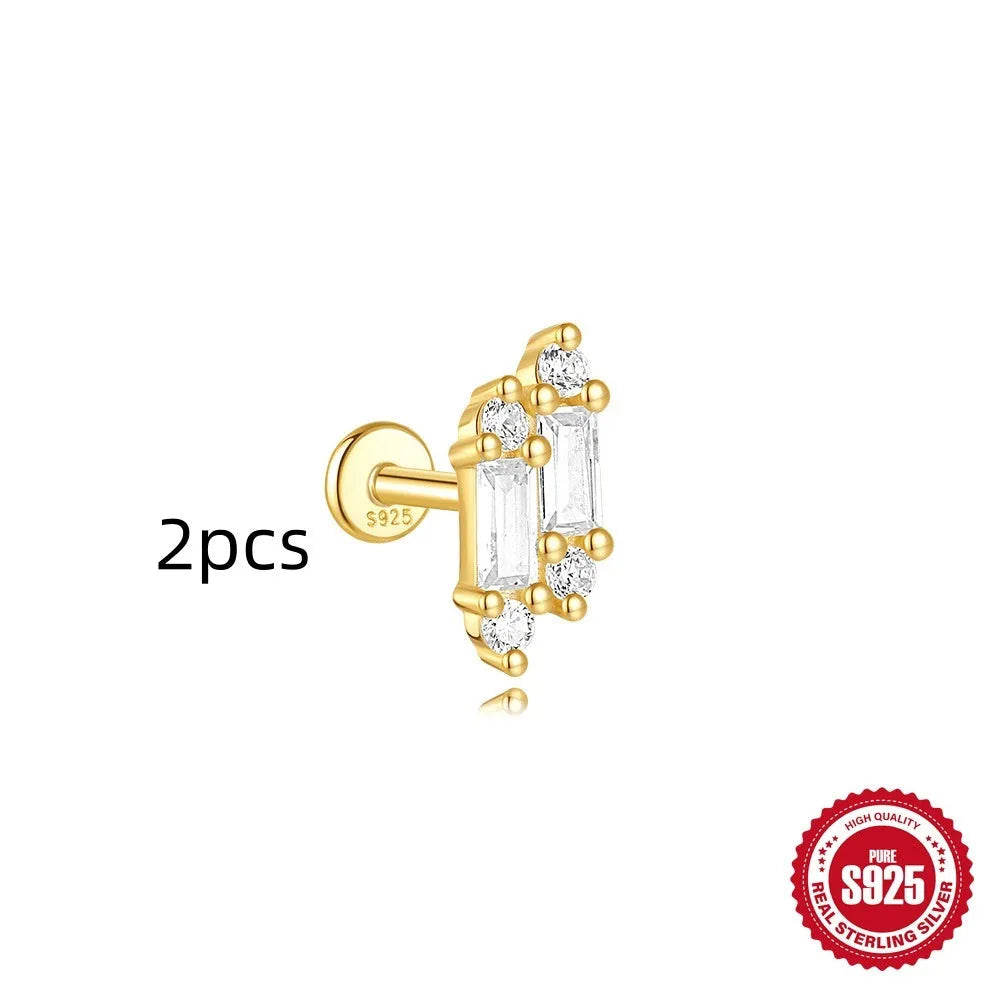 S925 sterling silver geometric kite shaped earrings with chain tassel and rhinestone detailing in gold tone finish