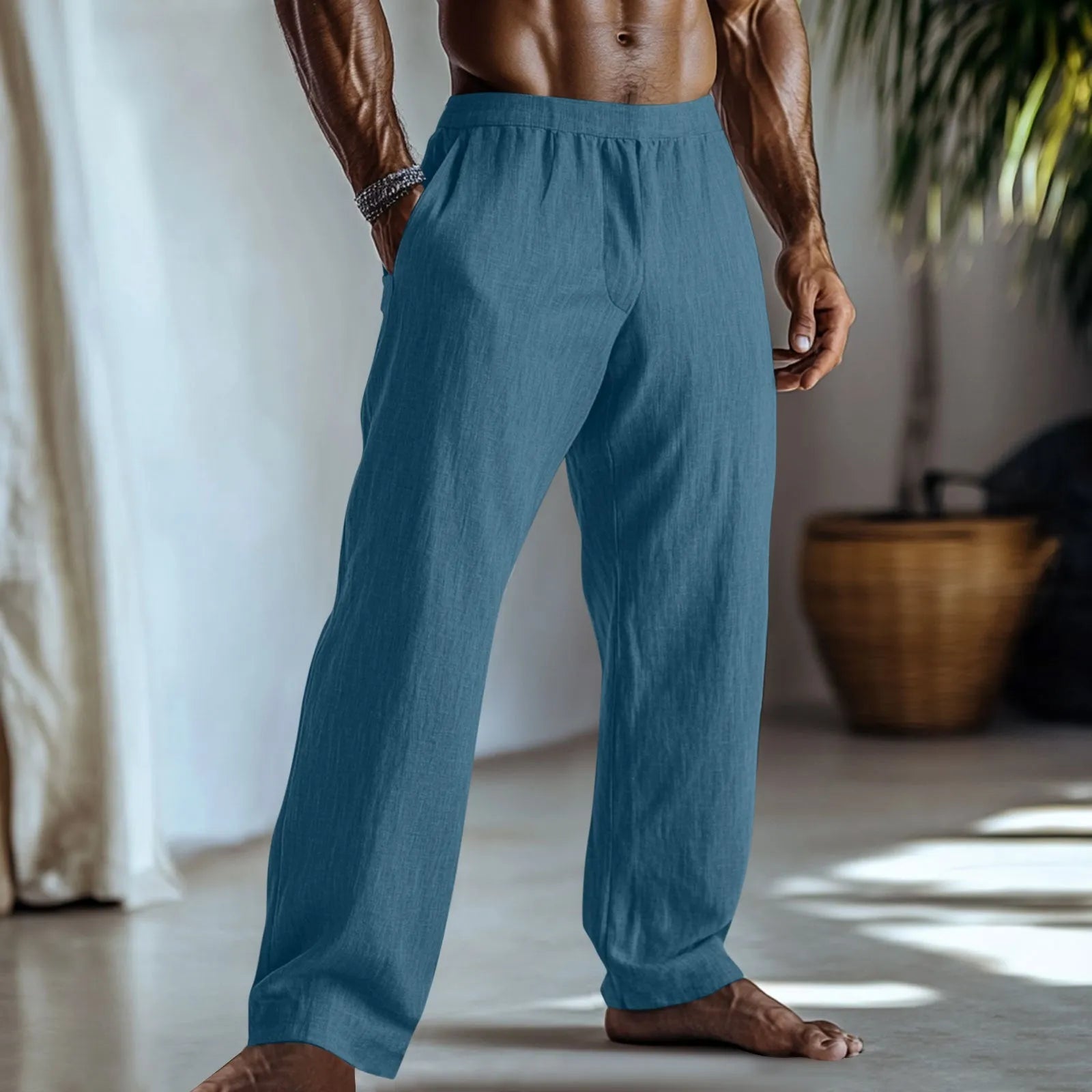 Men's straight leg casual trousers in light green cotton and linen fabric with visible pockets