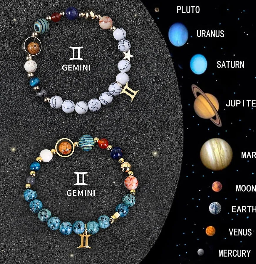 Set of two natural stone beaded bracelets featuring zodiac sign designs on a dark background