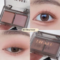 Cool two-tone eyeshadow palette showing pink and black matte and shimmer pressed powder in a single compact.