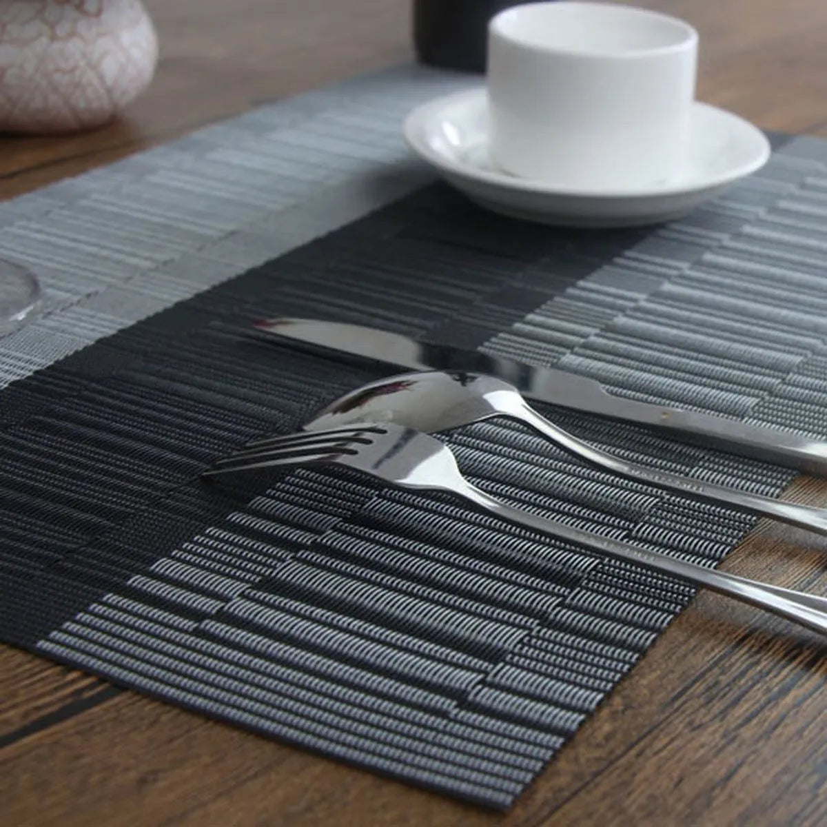 PVC non-slip dish mat in gradient bamboo design protecting kitchen worktop with dishes