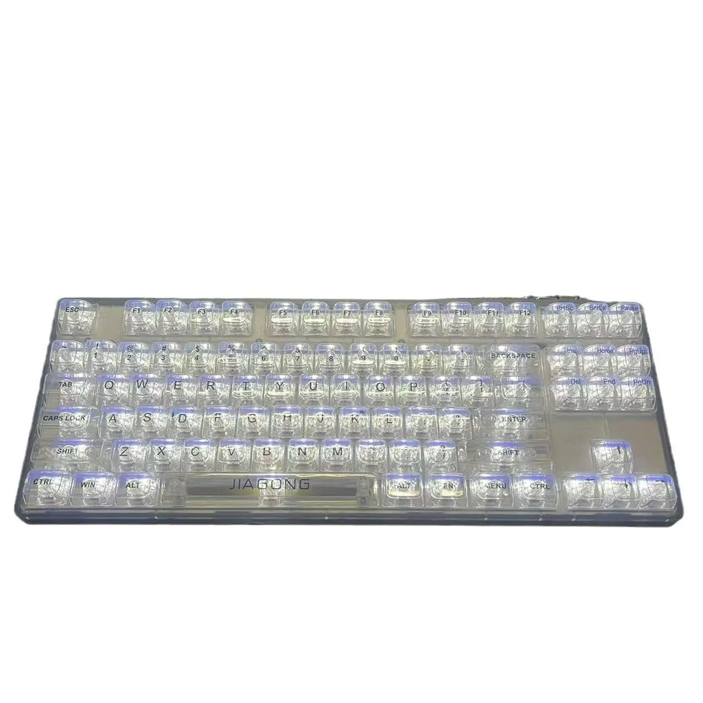 132 transparent plastic keyboard key caps arranged in full set with universal compatibility for mechanical and membrane keyboards