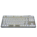 132 transparent plastic keyboard key caps arranged in full set with universal compatibility for mechanical and membrane keyboards